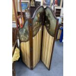 An early 20th century oak three fold screen, painted oil on canvas panels and stretched silk, height