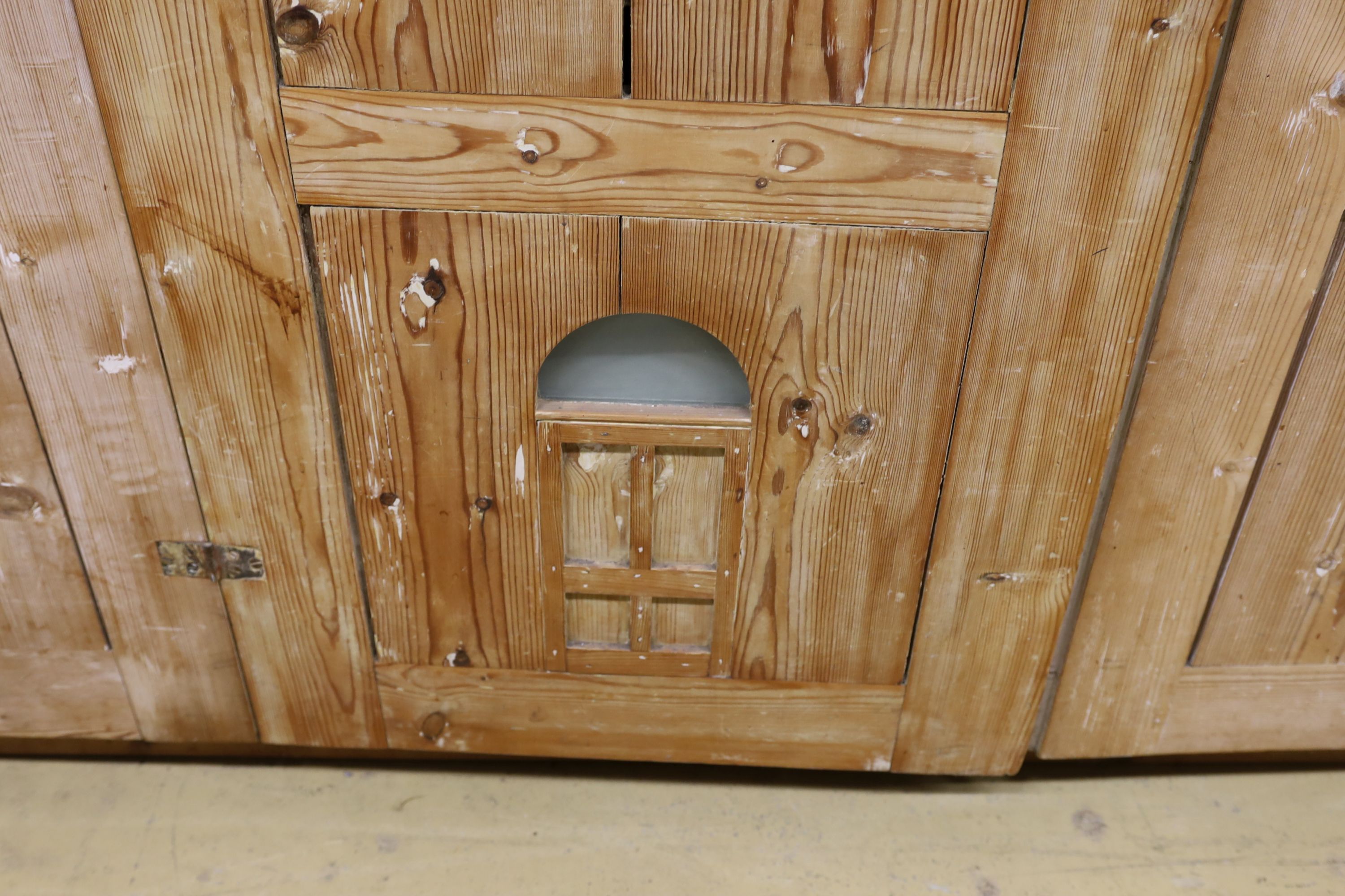 A 19th century stripped pine hall cupboard modelled as a dolls house the two door nine window facade - Image 7 of 20