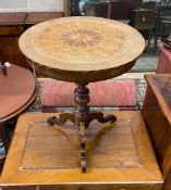An early 20th century French circular parquetry inlaid tripod table, diameter 51cm, height 71cm.