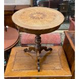 An early 20th century French circular parquetry inlaid tripod table, diameter 51cm, height 71cm.