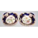 A pair of English porcelain shell shaped dessert dishes, c.1820-25, with floral decoration