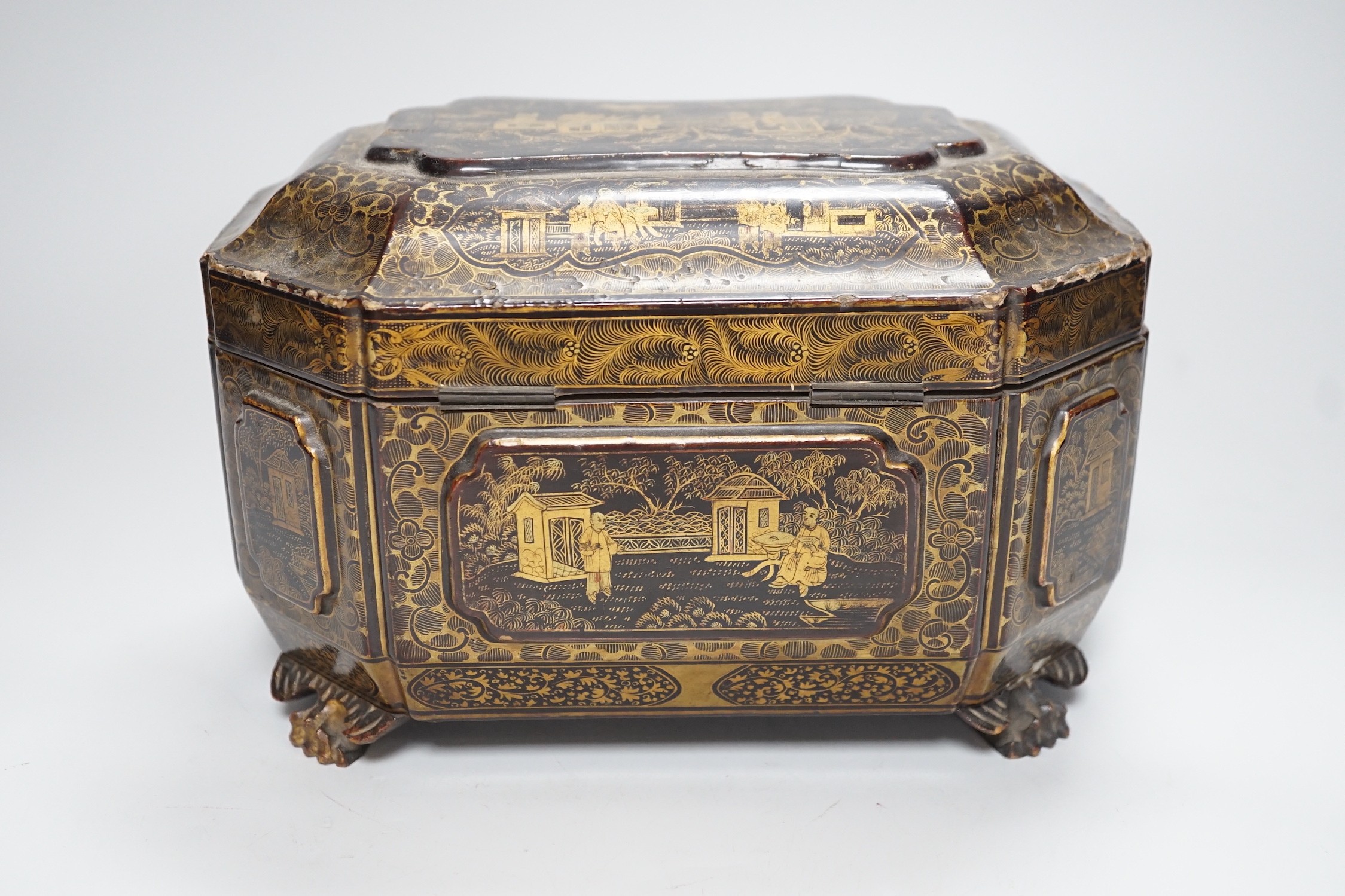 A 19th century Chinese chinoiserie lacquered sarcophagus form tea caddy, pewter lined interior - Image 4 of 6