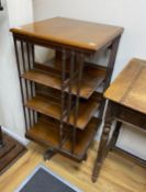 A large early 20th century oak revolving bookcase, width 59cm, depth 59cm, height 125cm