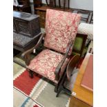 A Louis XVI style oak upholstered open armchair, width 63cm, depth 62cm, height 118cm