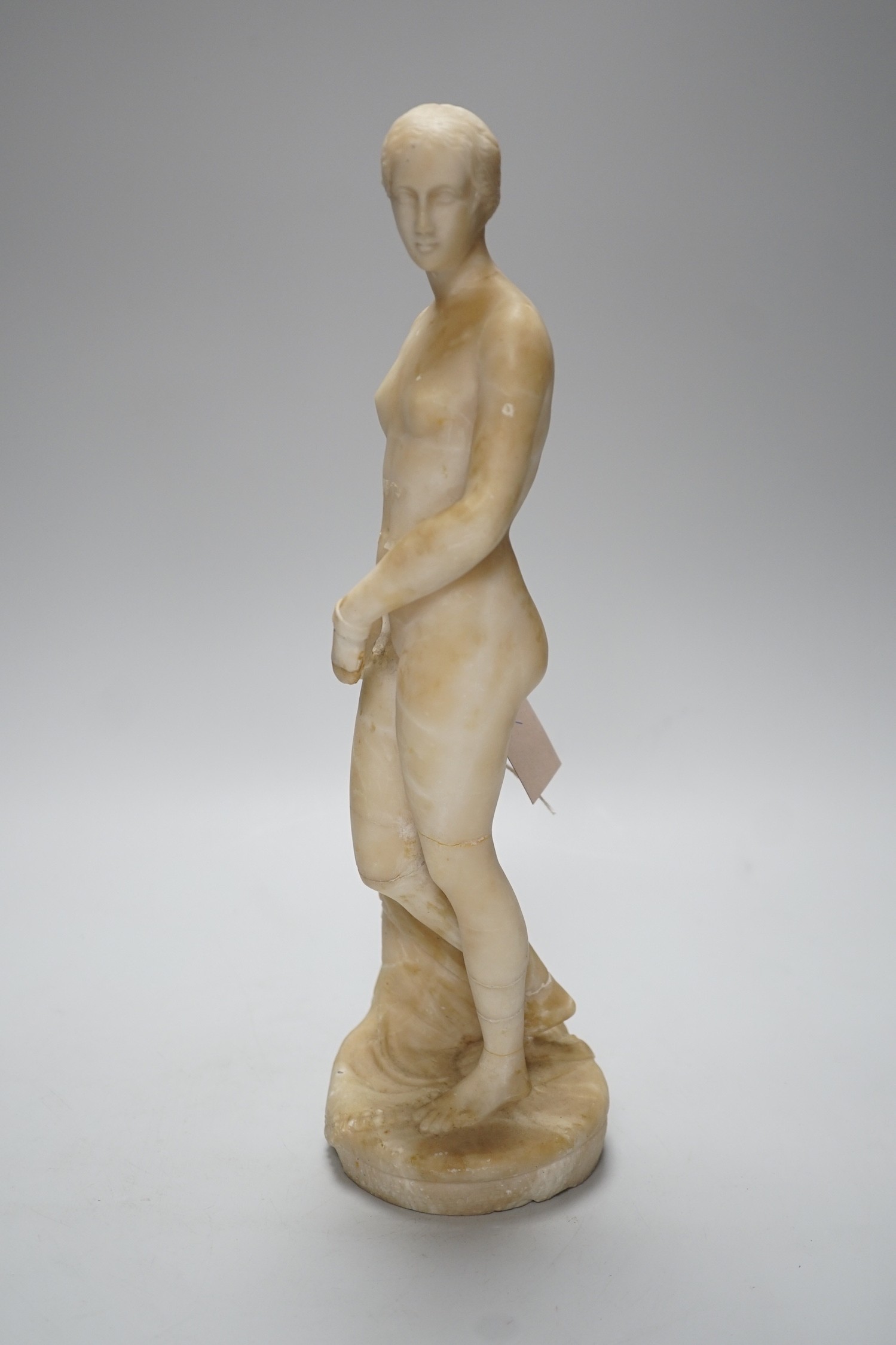 A carved alabaster female classical figure, the Greek slave Hiram Powers, 36cms high - Image 3 of 7