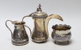 A Middle Eastern white metal and niello cream jug, a sugar bowl and coffee pot, 16.4cm, gross weight
