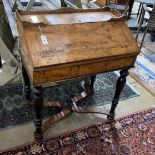 An 18th century Dutch figured walnut bureau with 'X' stretcher, width 84cm, depth 53cm, height