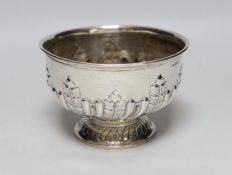 An Edwardian demi fluted silver presentation pedestal rose bowl, with engraved inscription, Mappin &