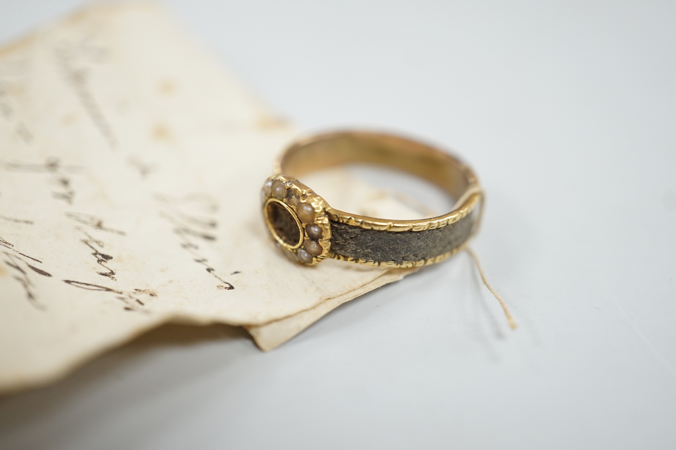 A 19th century yellow metal, split pearl and plaited hair set mourning ring, size O, gross weight - Image 3 of 6