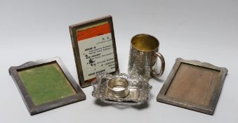 A Victorian engraved silver christening mug, London, 1890, 81mm, a silver napkin ring, a repousse