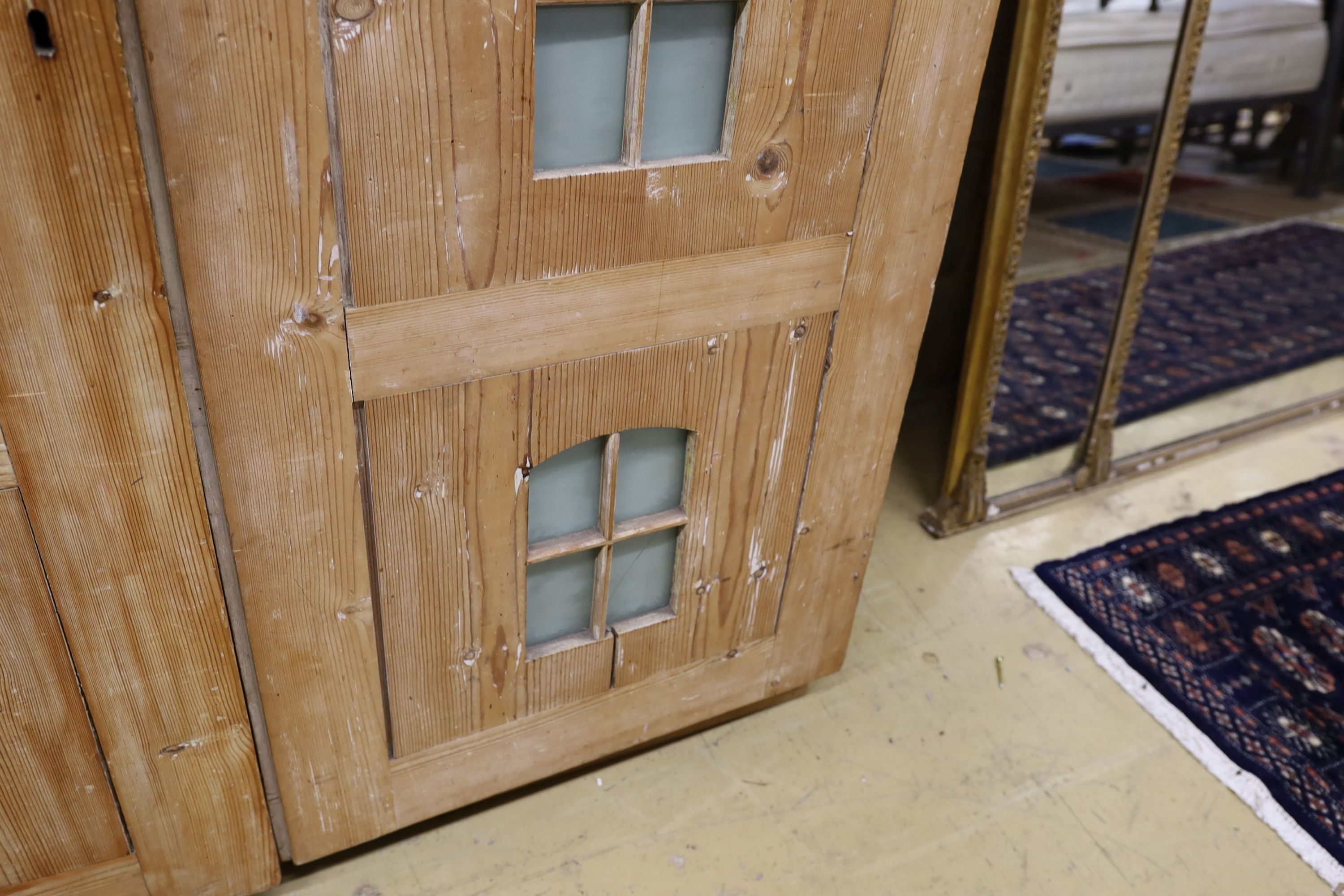 A 19th century stripped pine hall cupboard modelled as a dolls house the two door nine window facade - Image 10 of 20