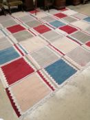 A large Kilim polychrome flatweave carpet of patchwork design, 460 x 370cm