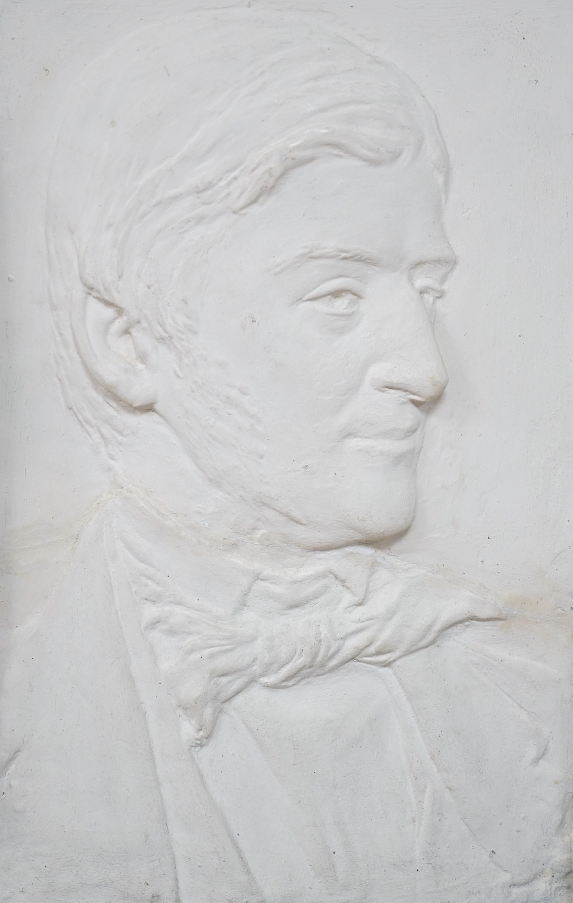 A relief moulded portrait bust, Ralph Waldo Emerson, in architectural frame, 37cms wide x 58.5cms