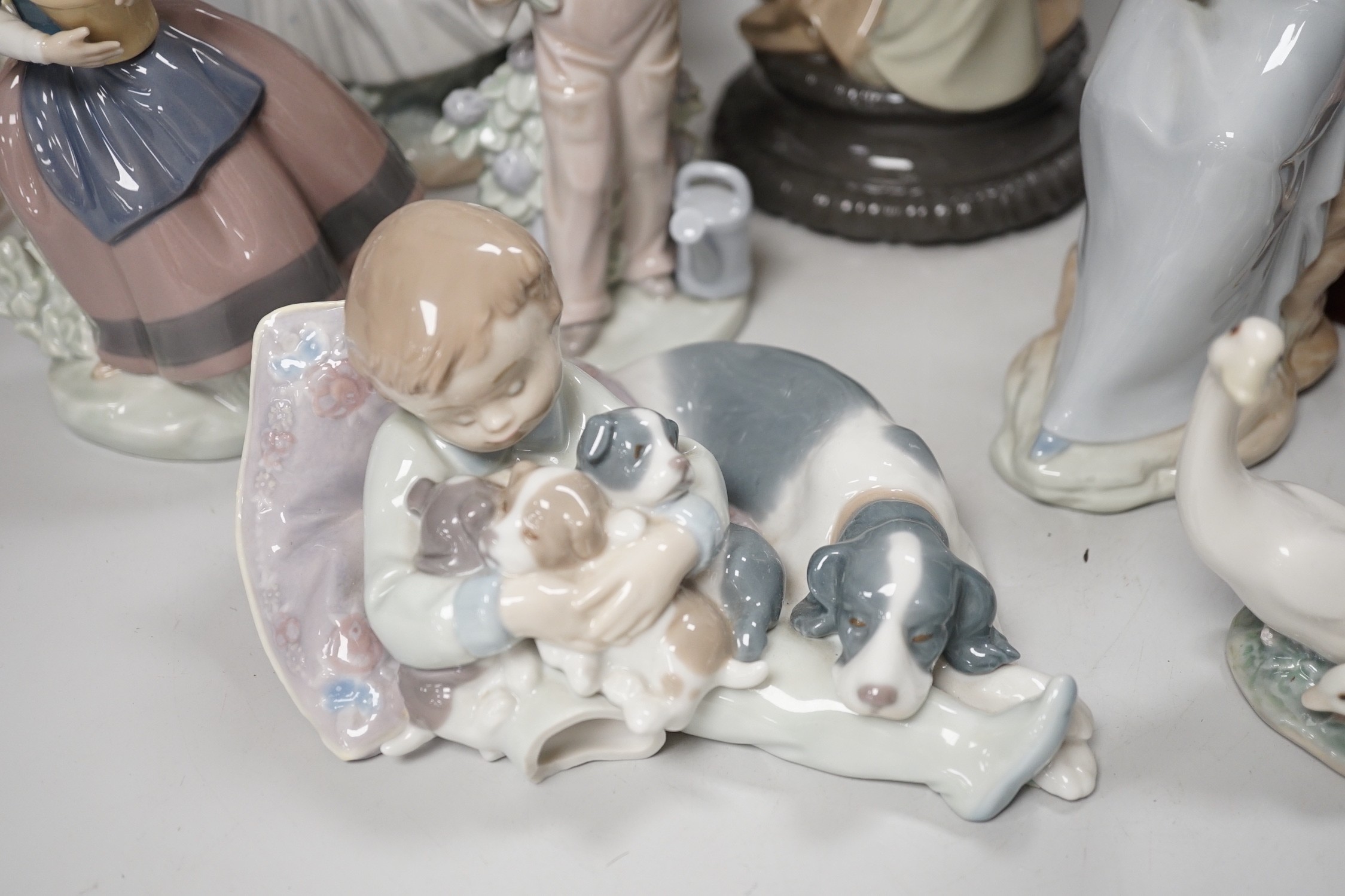 Seven Lladro and two Nao porcelain figures together with another, stuck to base so mark can’t be - Image 2 of 9