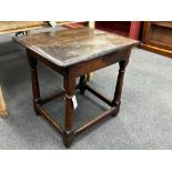 A 17th century rectangular oak small table with twin planked top, width 62cm, depth 52cm, height