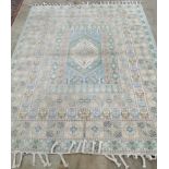 A Moroccan pale blue ground rug, 214 x 168cm