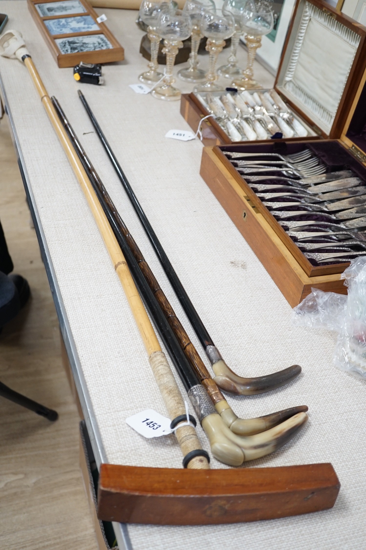 Three horn handled walking sticks and a polo mallet, Longest 138cm - Image 2 of 2