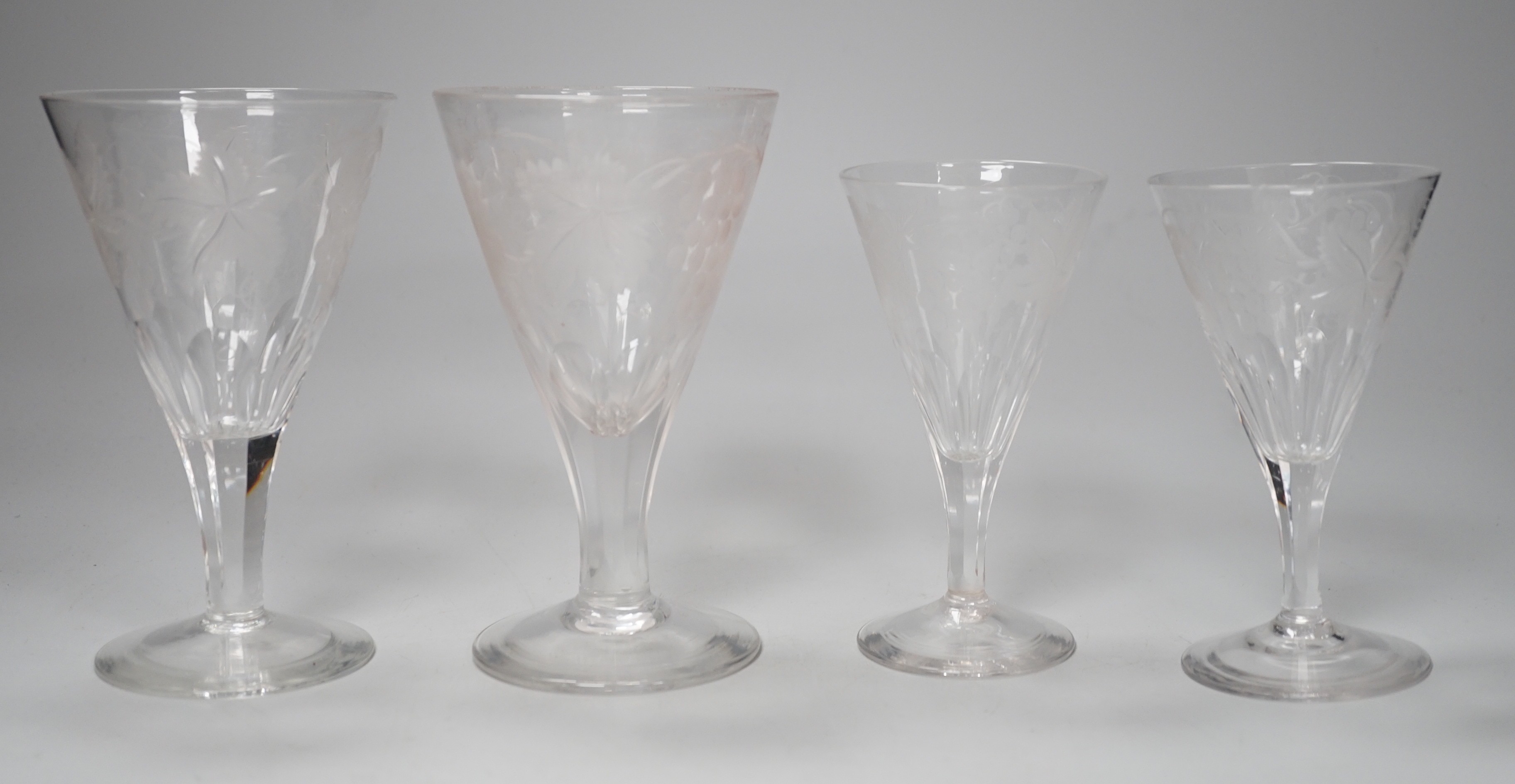 A part suite of Edwardian vineous etched glasses. Tallest 15cm