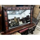 A William IV rosewood and mahogany veneered overmantel mirror, width 116cm, height 62cm