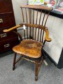 A mid 19th century and later Windsor comb back elbow chair, width 64cm, depth 39cm, height 97cm
