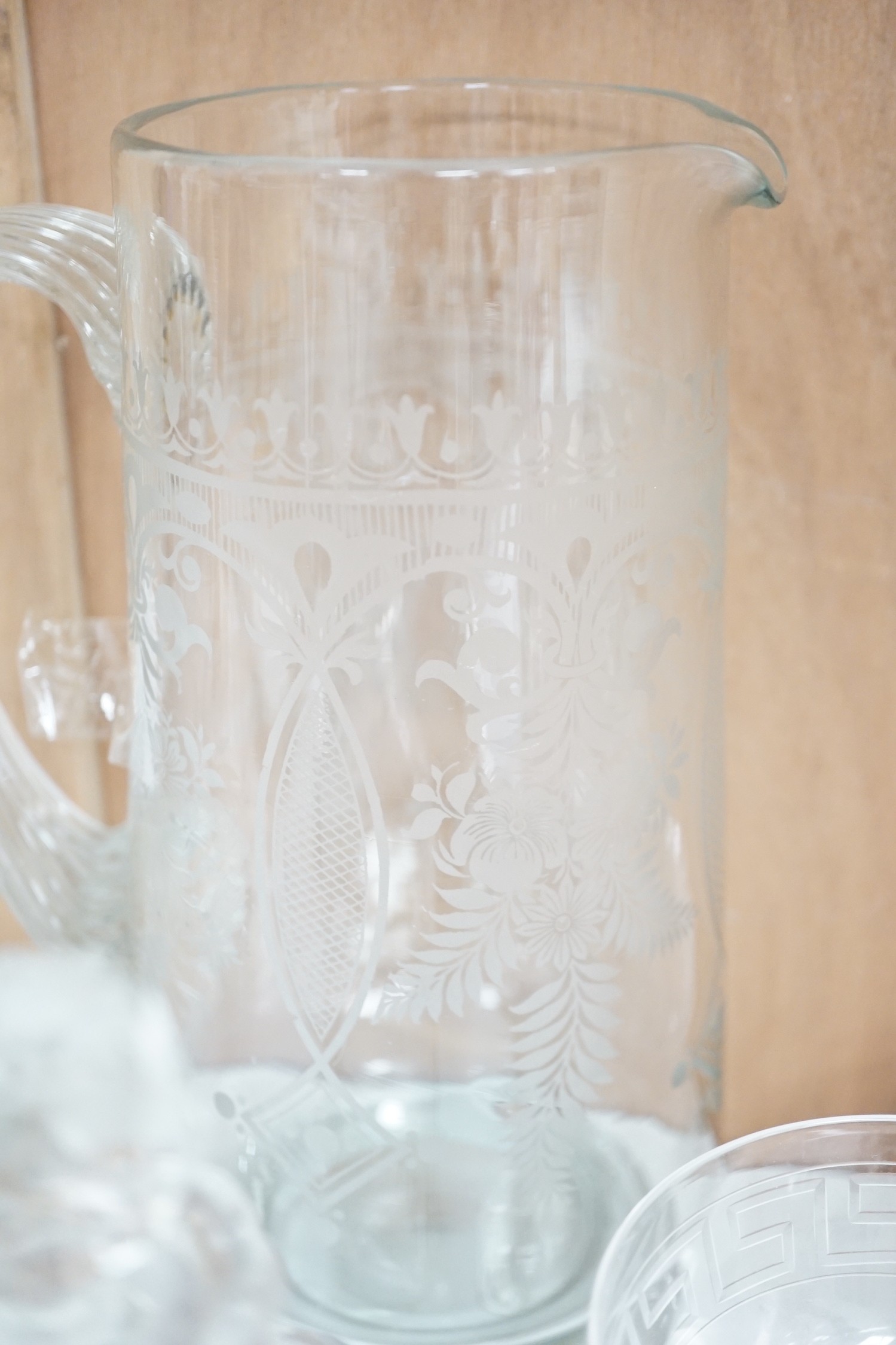 A selection of various engraved glassware, together with a cut glass decanter and stylish jug. - Image 7 of 7