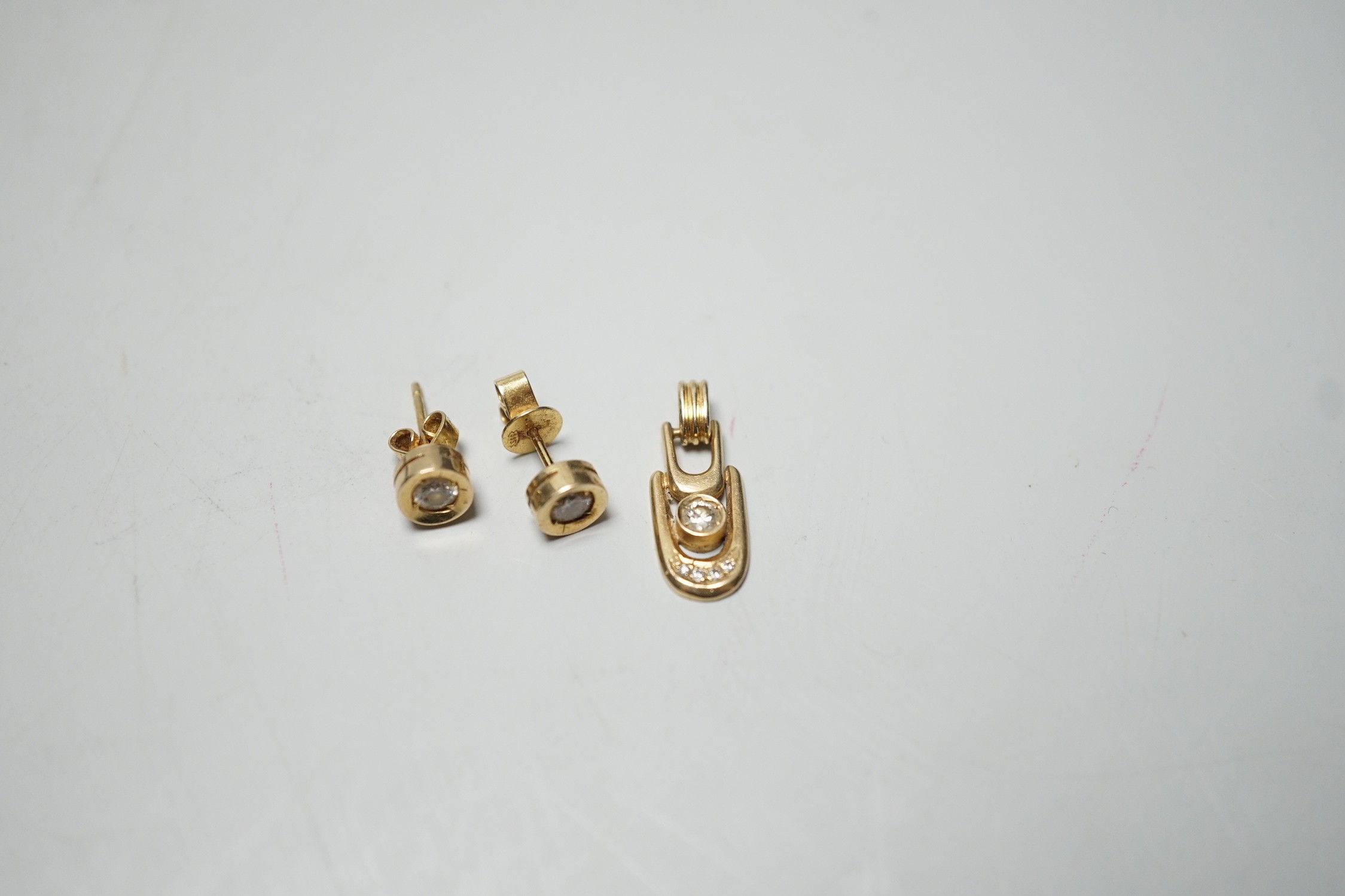 A modern pair of 585yellow metal and solitaire diamond set ear studs, 6mm and a matching pendant, - Image 4 of 5