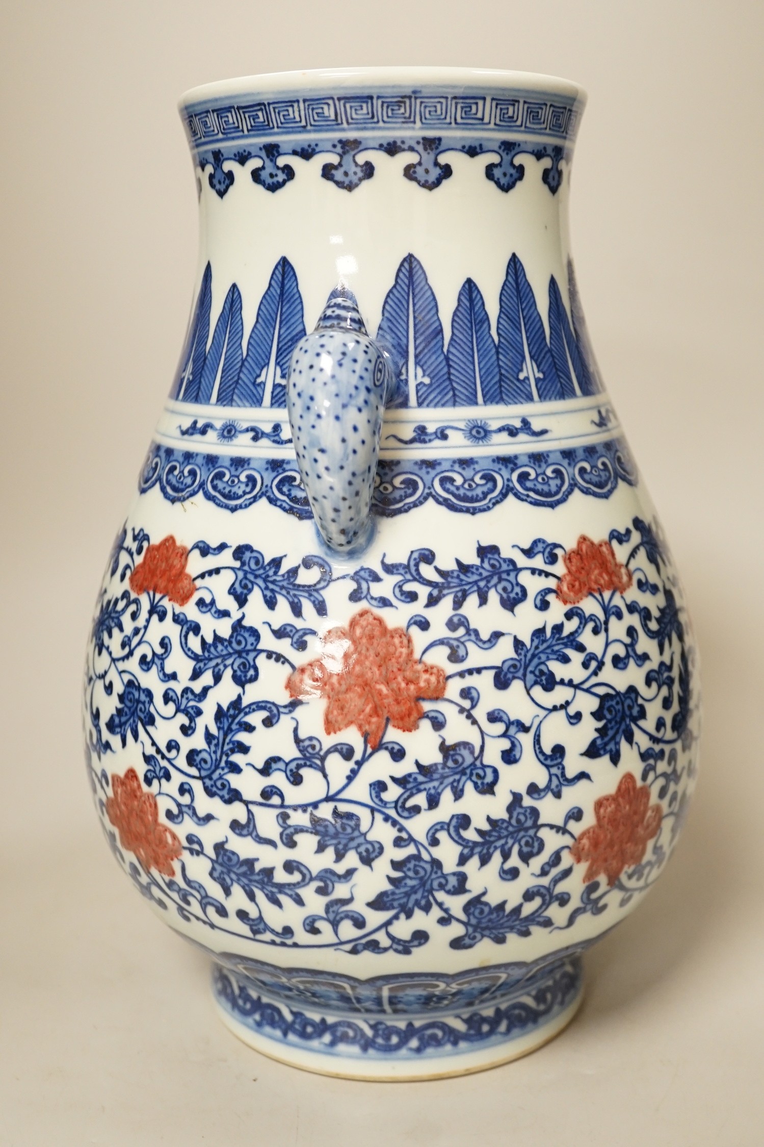 A Chinese underglaze blue and copper red two-handled vase. 31cm tall - Image 2 of 4