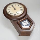 A small drop-dial wall clock, 31cm long