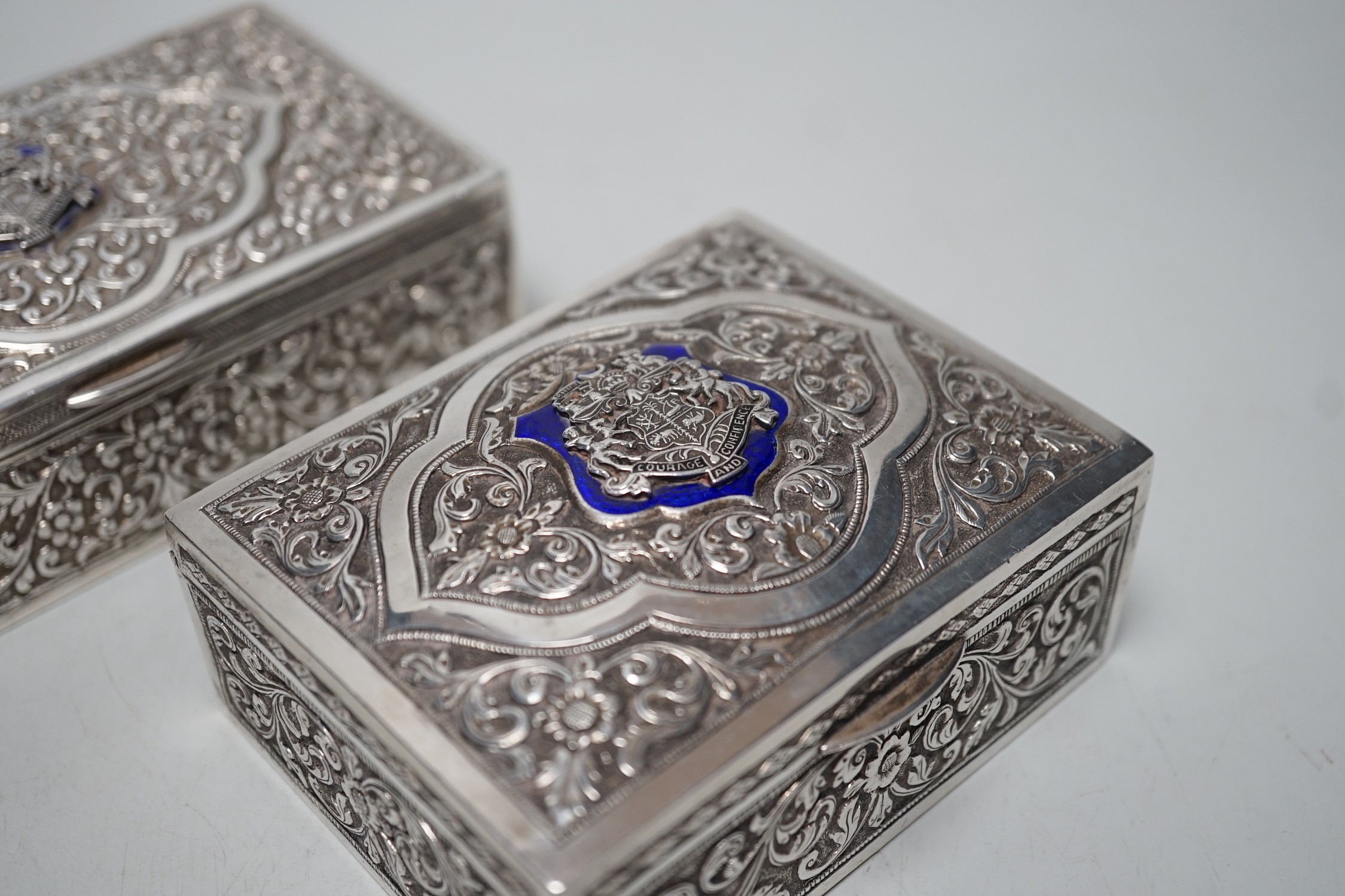Two early 20th century Indian embossed white metal rectangular boxes, both with applied enamelled - Image 4 of 5