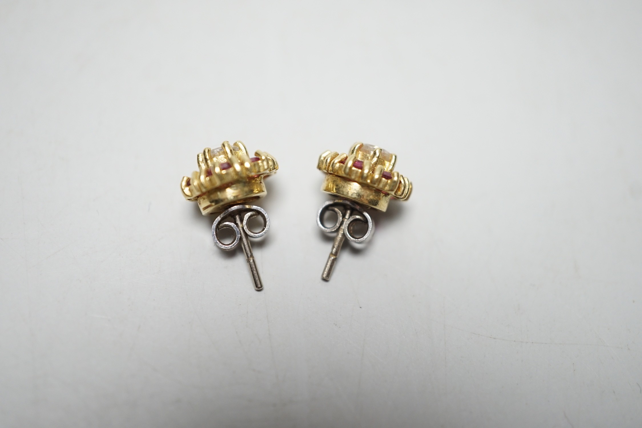A pair of 18ct gold, diamond and garnet? circular cluster ear studs, 9mm, gross weight 4 grams. - Image 4 of 4