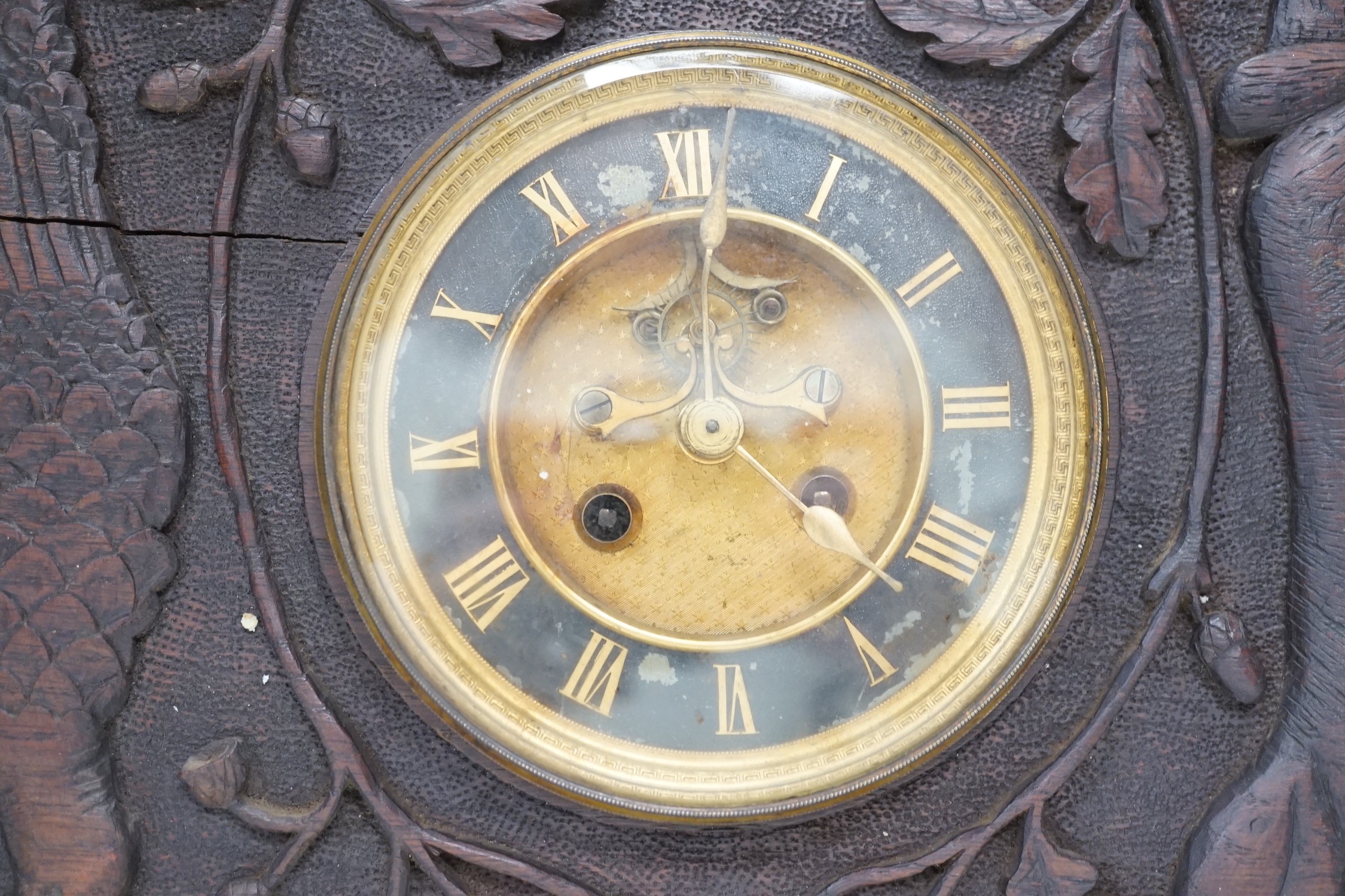 A late 19th century / early 20th century folk art carved oak cased clock, decorated with hanging - Image 2 of 7