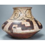 A Shipibo pottery water vessel with geometric pattern, Peru, 26cm tall