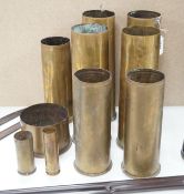 A group of WWI shell casings and two bayonests