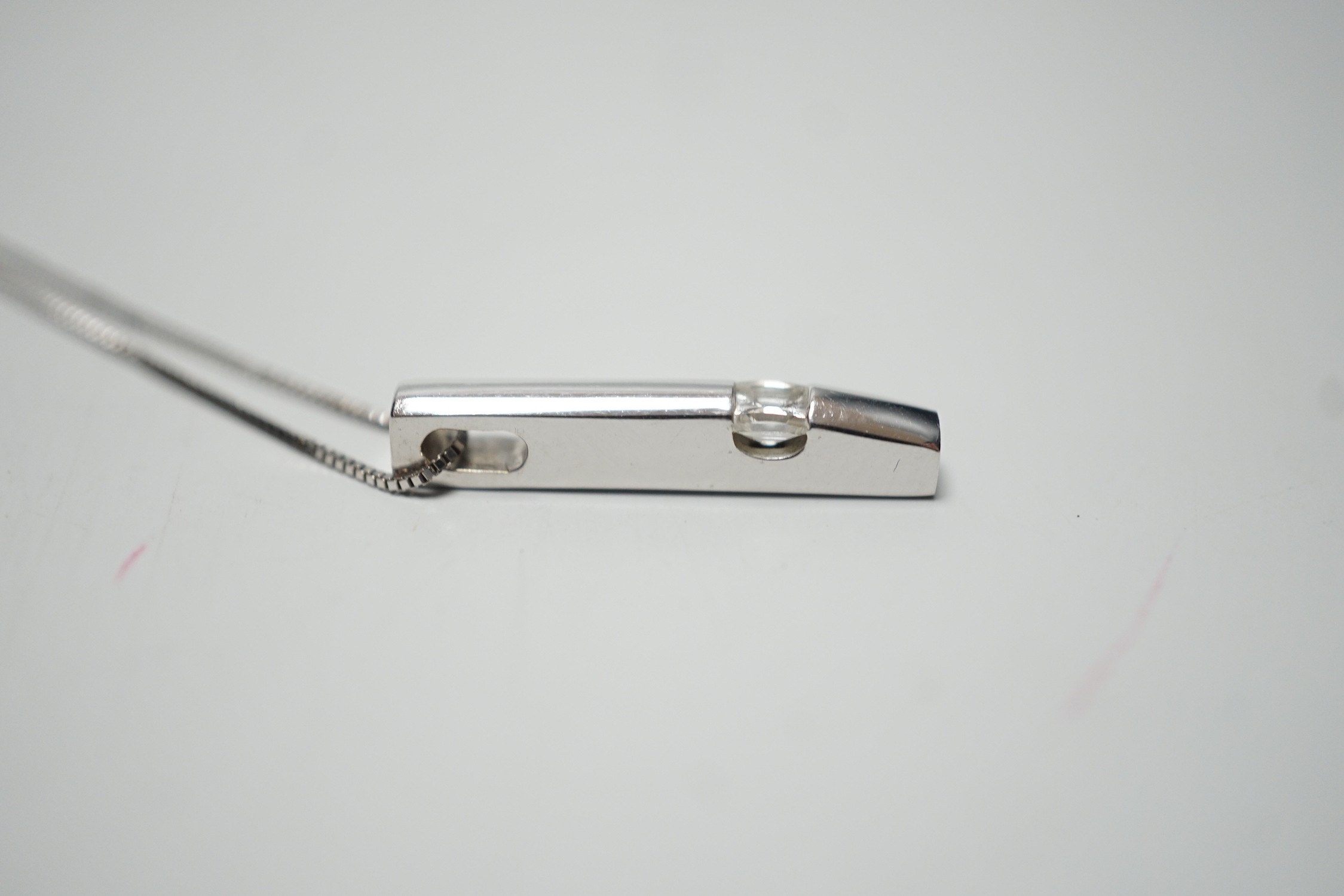 A modern 18ct white gold and solitaire diamond set pendant, 22mm, on an 18ct white gold fine link - Image 3 of 4