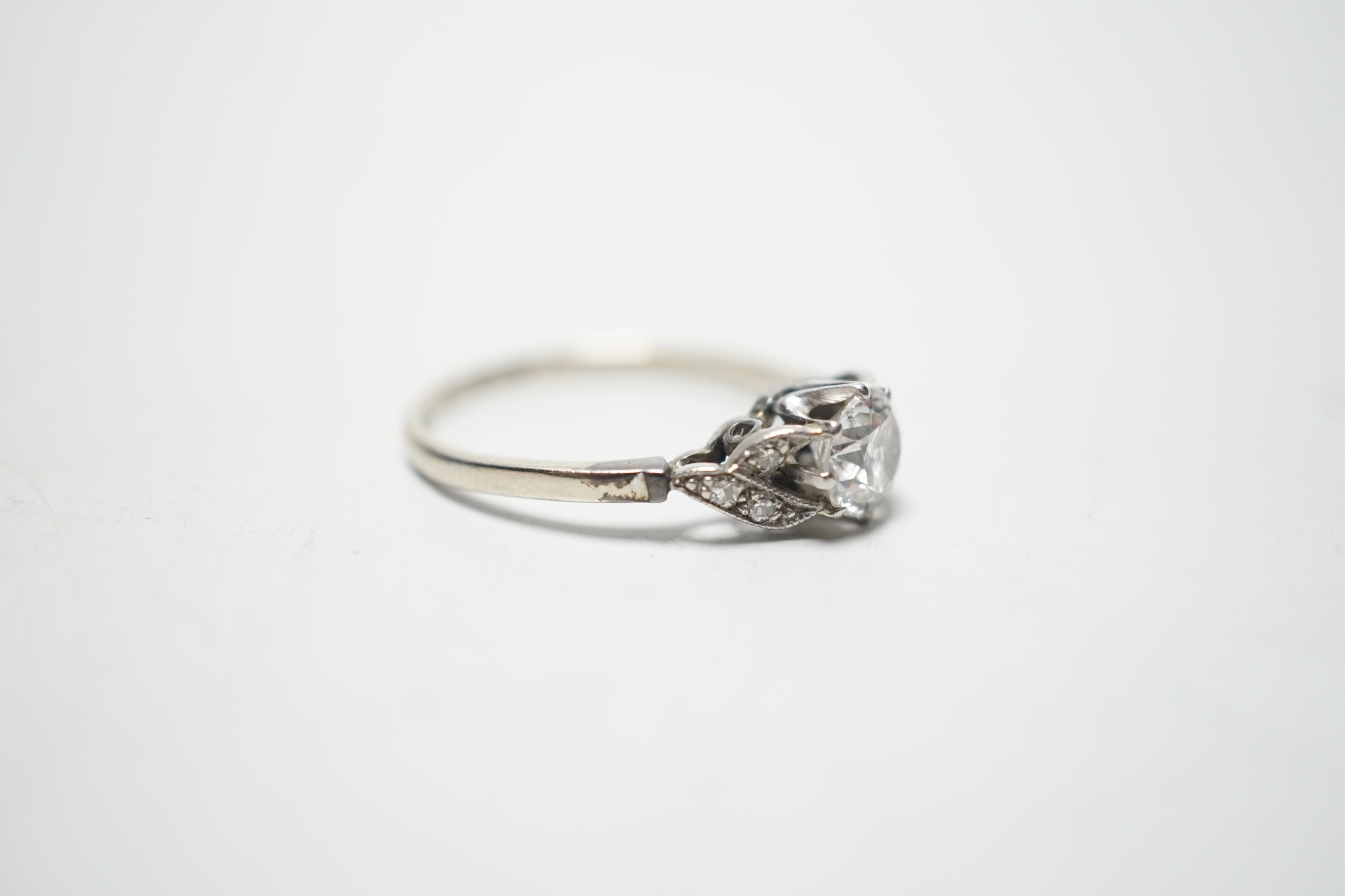 An 18ct white metal and single stone diamond ring, with diamond chip set shoulders, the stone - Image 3 of 4