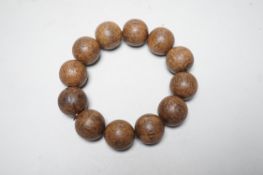 A Chinese wood bead bracelet