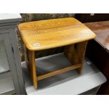 An Ercol rectangular elm occasional table, width 51cm, height 42cm together with an Ercol television