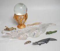 A crystal ball on gilt metal stand, 19cm tall, together with a hermatite crocodile, a jade type