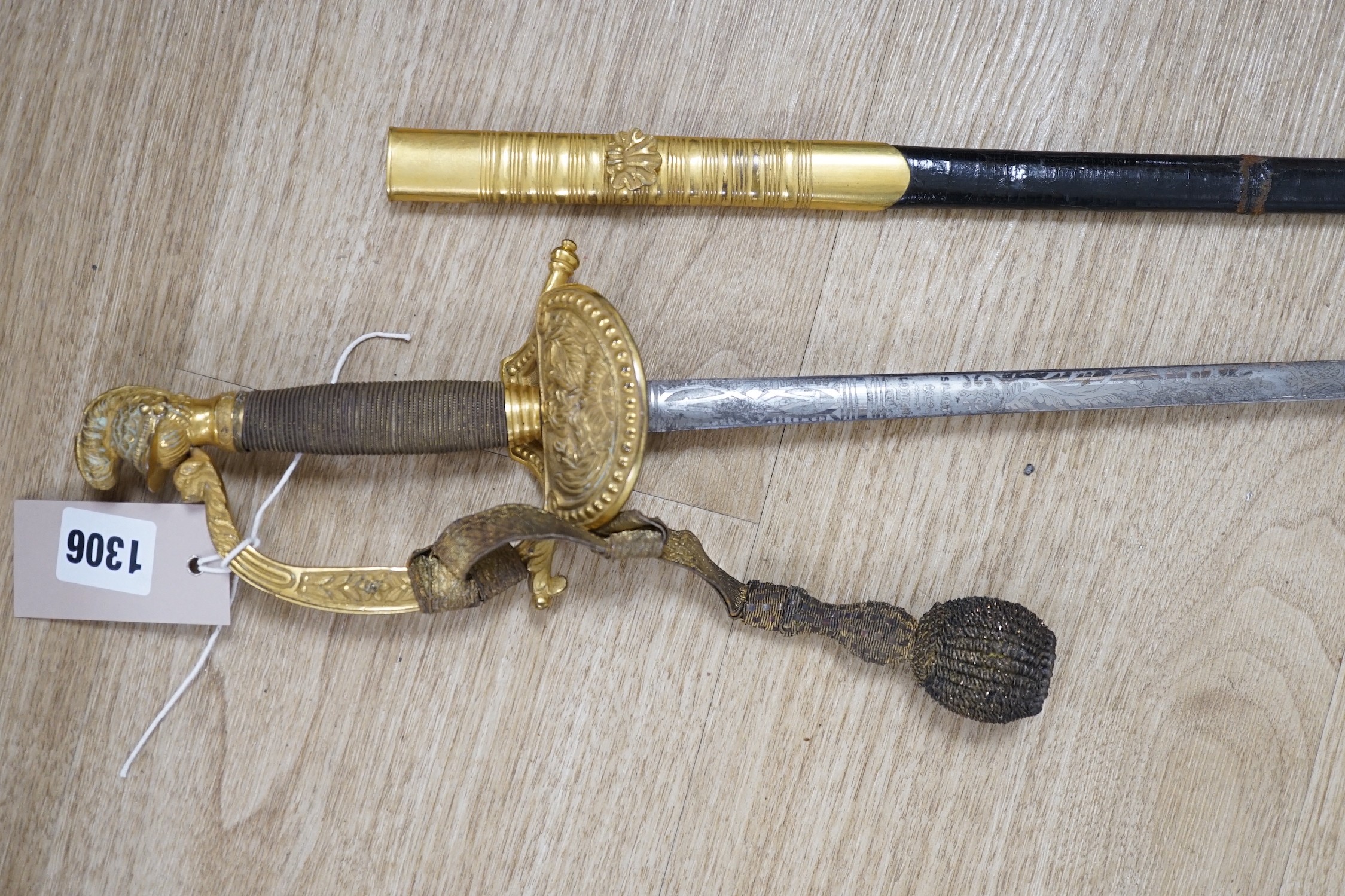 A 19th century officer's dress sword, made by Silver &Co. London with scabbard and leather cover - Image 2 of 5