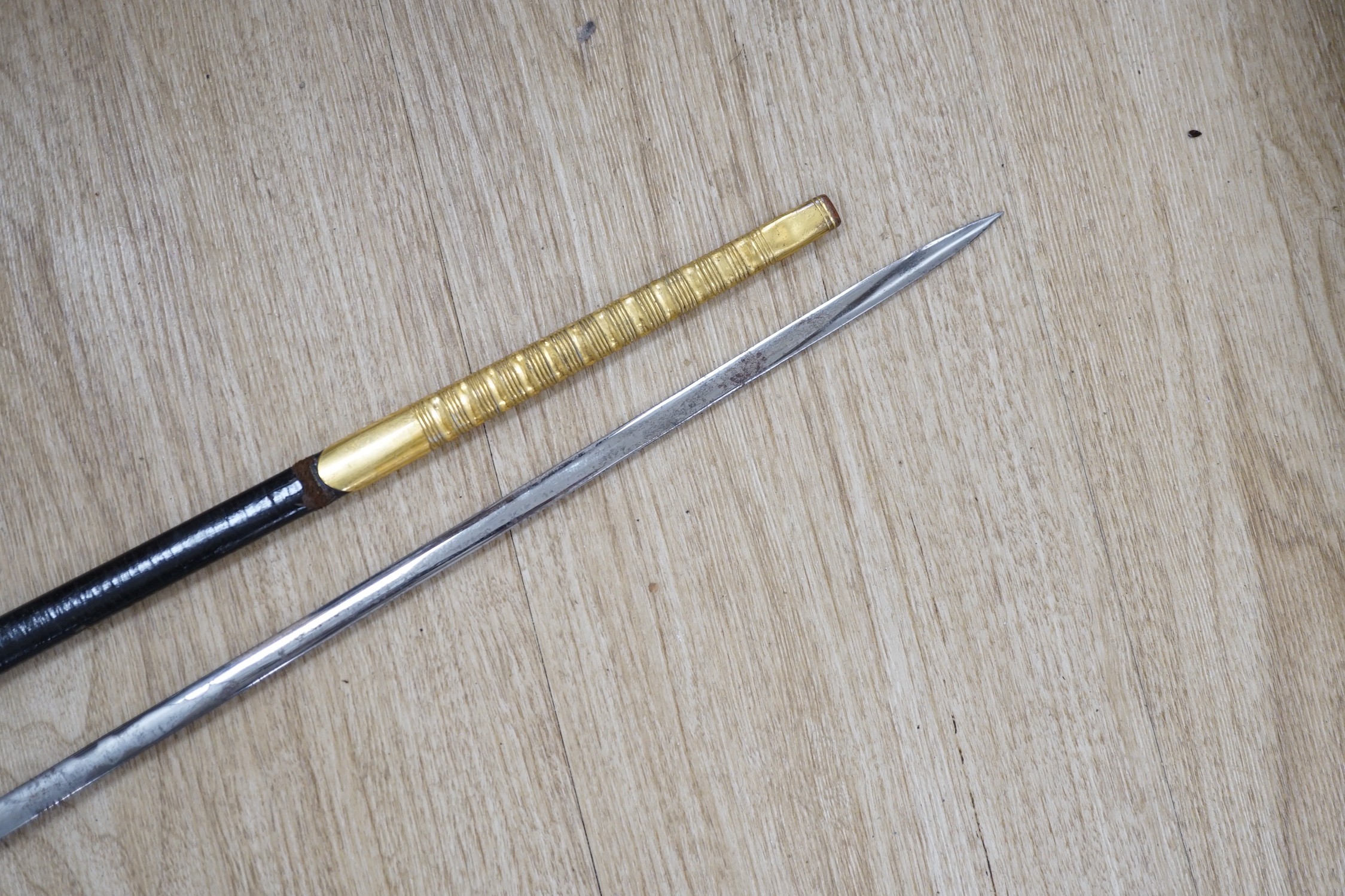 A 19th century officer's dress sword, made by Silver &Co. London with scabbard and leather cover - Image 5 of 5