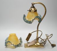 A brass desk lamp and two coloured glass shades, 34cm
