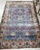 An early 20th century North West Persian blue ground rug, 200 x 134cm