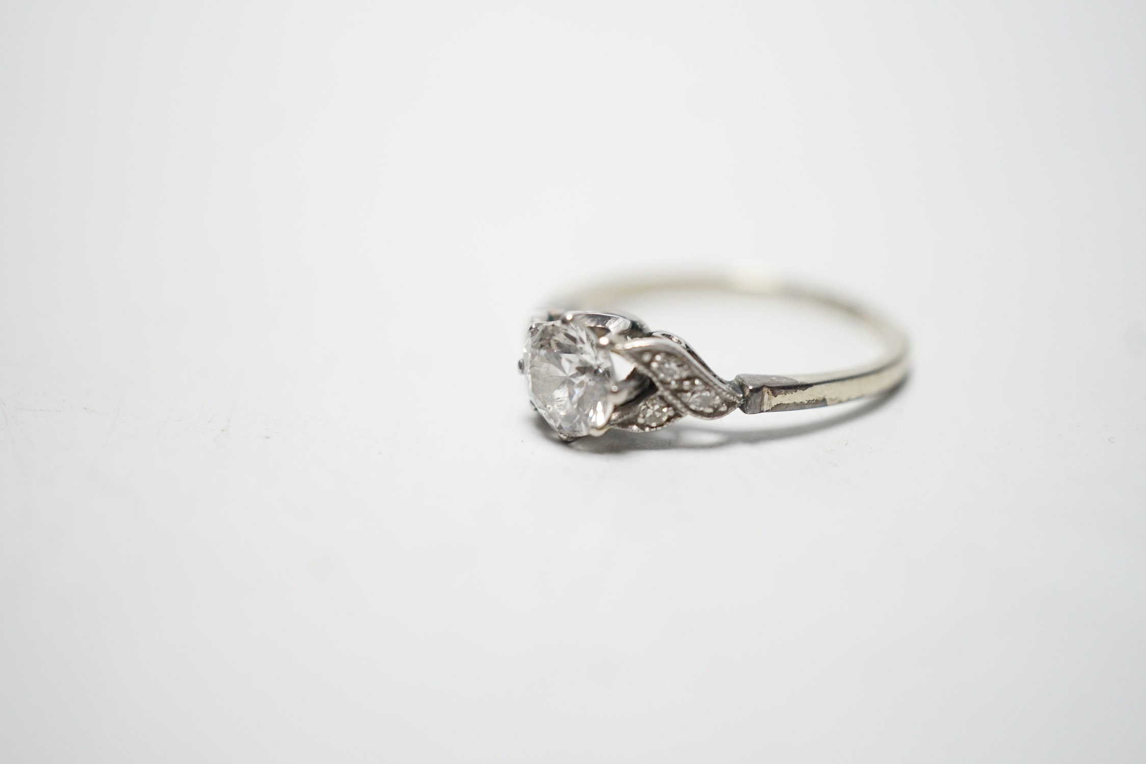 An 18ct white metal and single stone diamond ring, with diamond chip set shoulders, the stone - Image 2 of 4