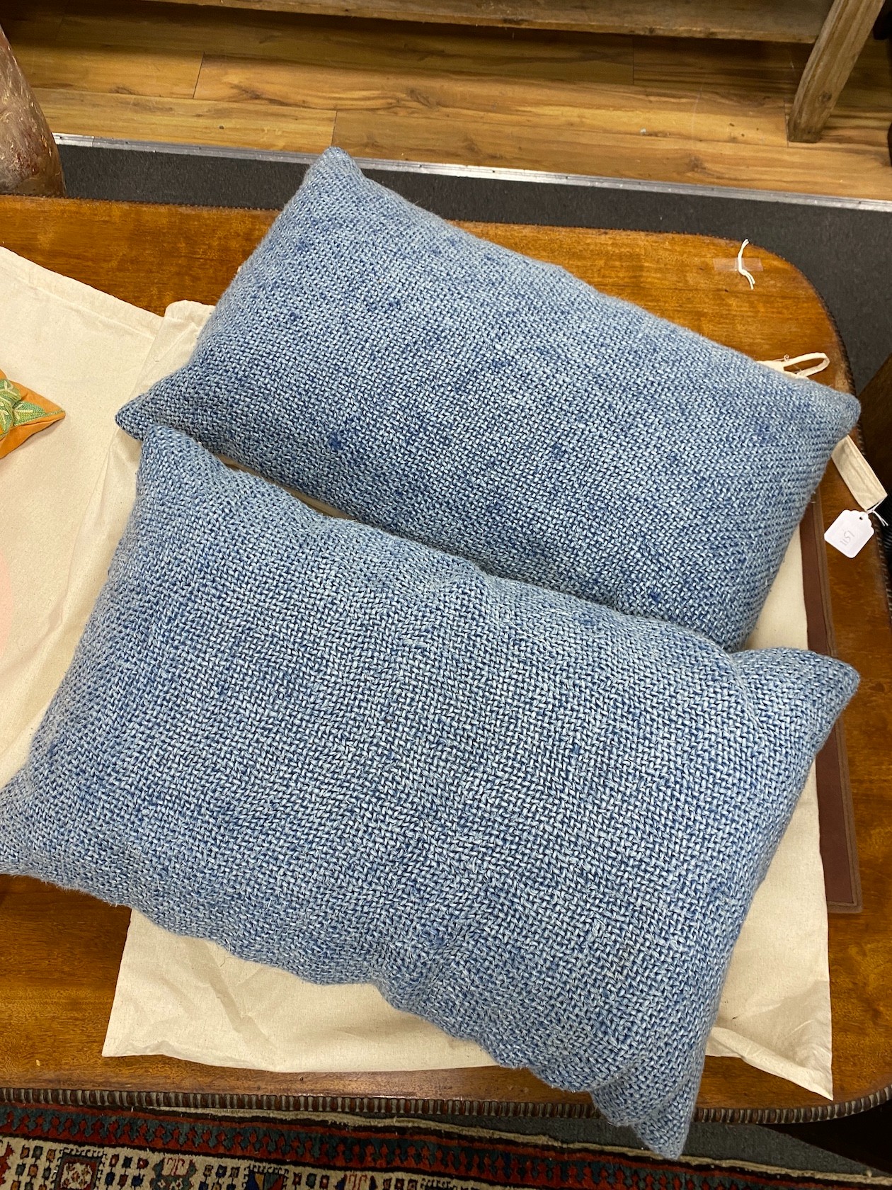 Two pairs of polychrome floral embroidered and blue woven cushions, larger 50cm square. - Image 4 of 6