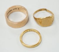 A 1930's 22ct gold wedding band, size K, 4.1 grams, a 9ct gold wedding band, size Q, 9.3 grams and a