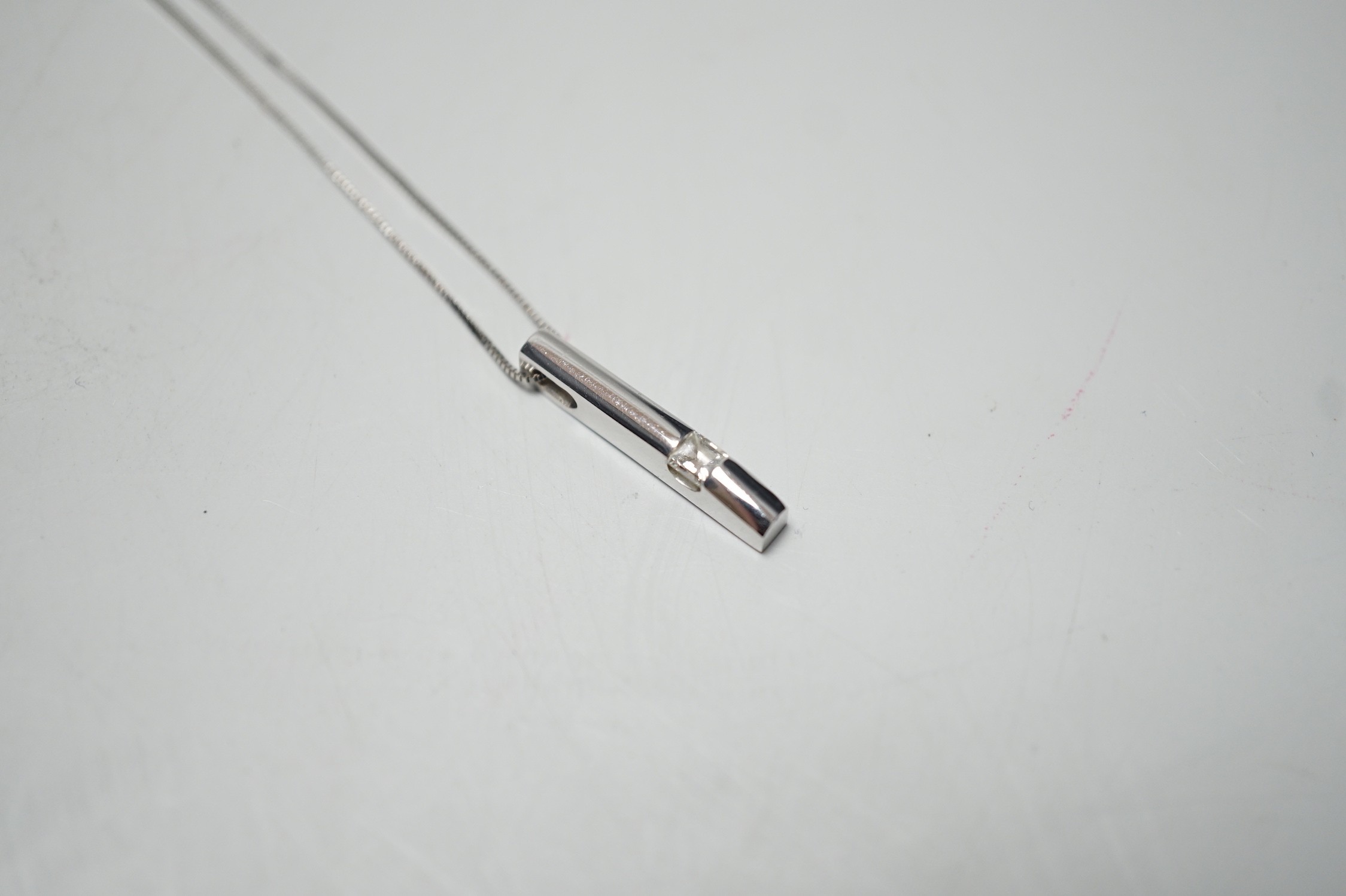 A modern 18ct white gold and solitaire diamond set pendant, 22mm, on an 18ct white gold fine link - Image 2 of 4