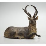 A Viennese cold-painted bronze model of a deer. 11cm wide