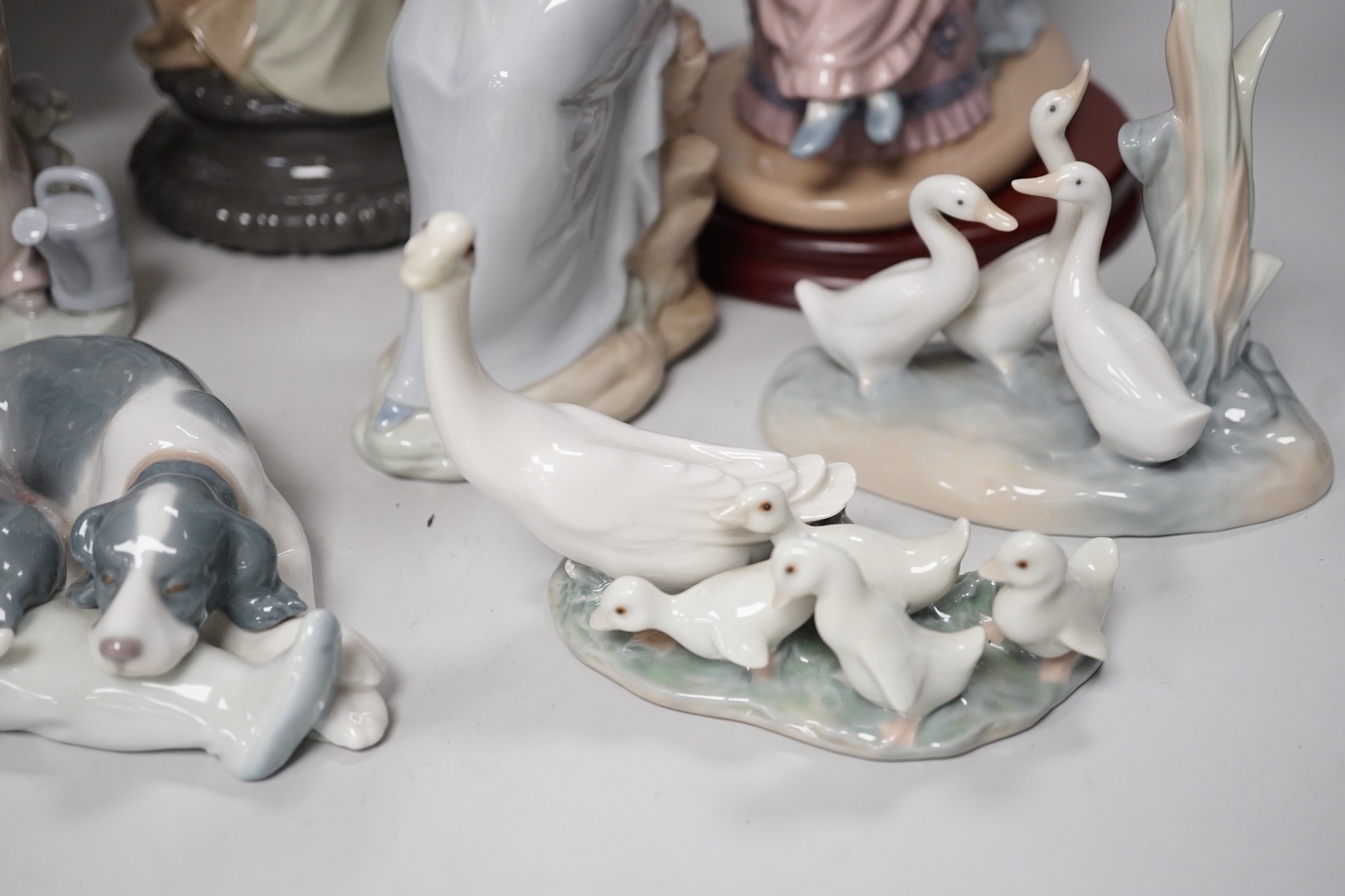 Seven Lladro and two Nao porcelain figures together with another, stuck to base so mark can’t be - Image 3 of 9