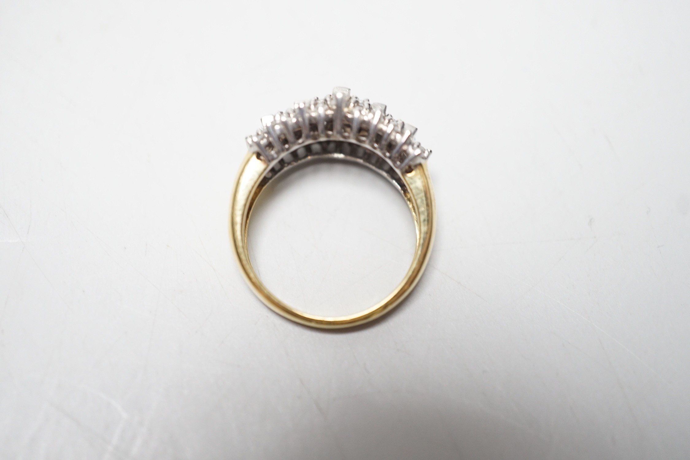 A modern yellow metal, round and baguette cut diamond set half hoop cluster ring, size L/M, gross - Image 4 of 4