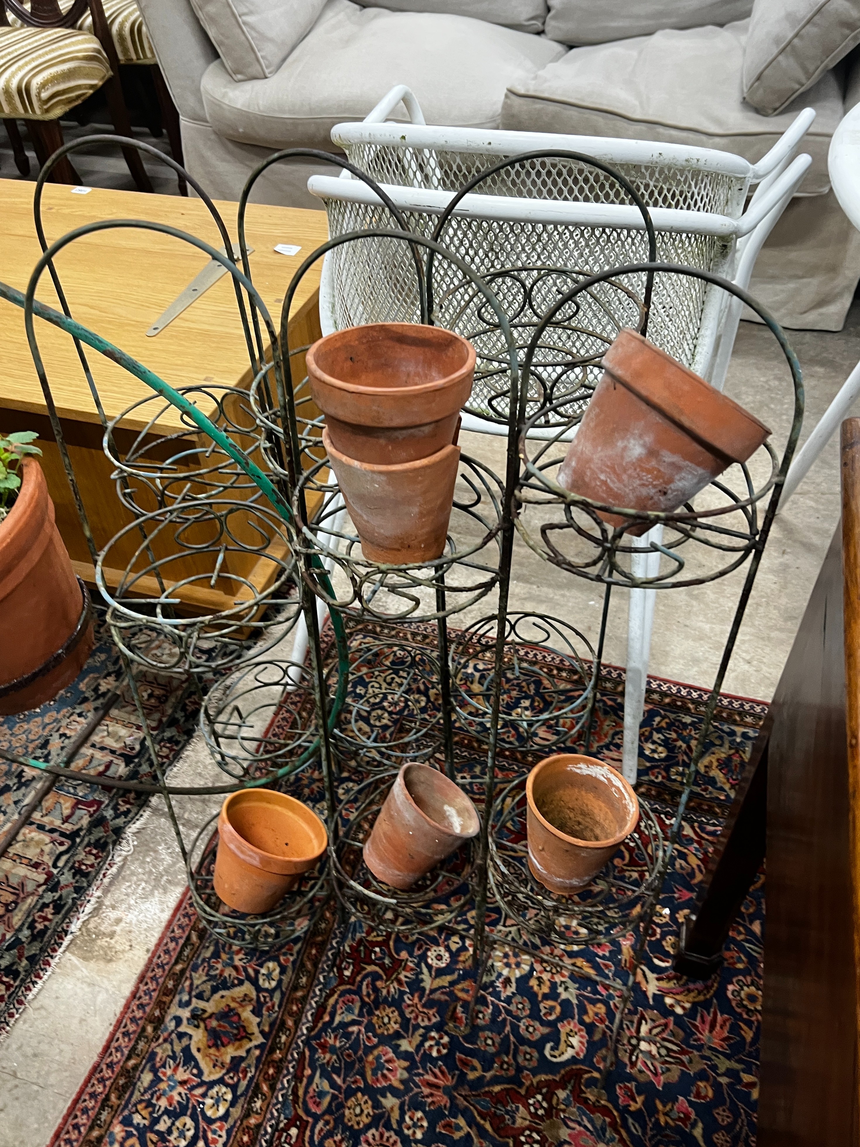 A wrought iron bicycle pot stand, height 98cm together with a pair of folding wirework pot stands - Bild 2 aus 2